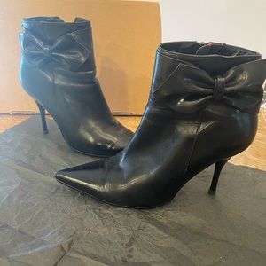 Black patent leather zip up booties. Size 7/Size 35